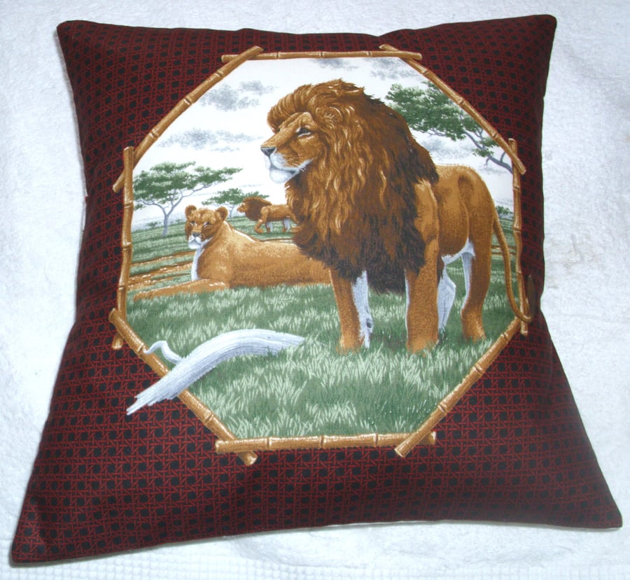 On Safari  Lions and Lioness on a  grassy plain cushion
