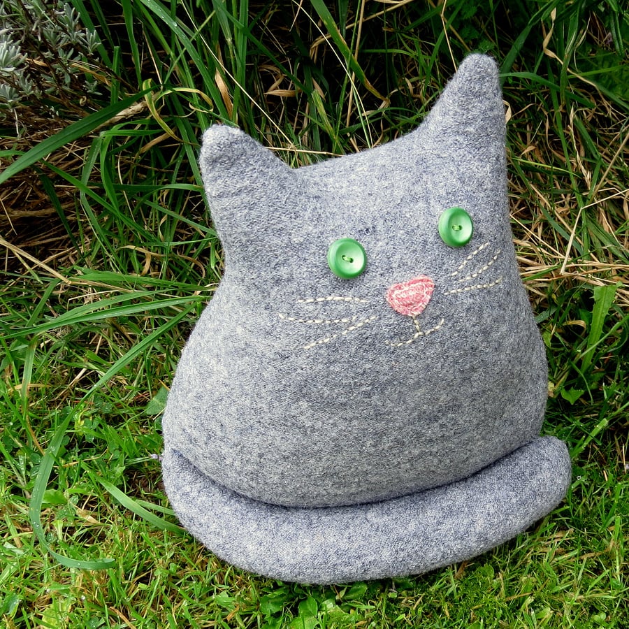 Little grey cat.  A cat shaped cushion, made from a tactile grey wool.