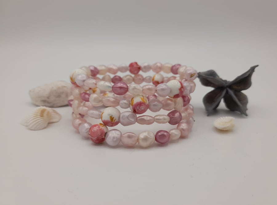 Faux pearl and floral beaded memory wire bracelet