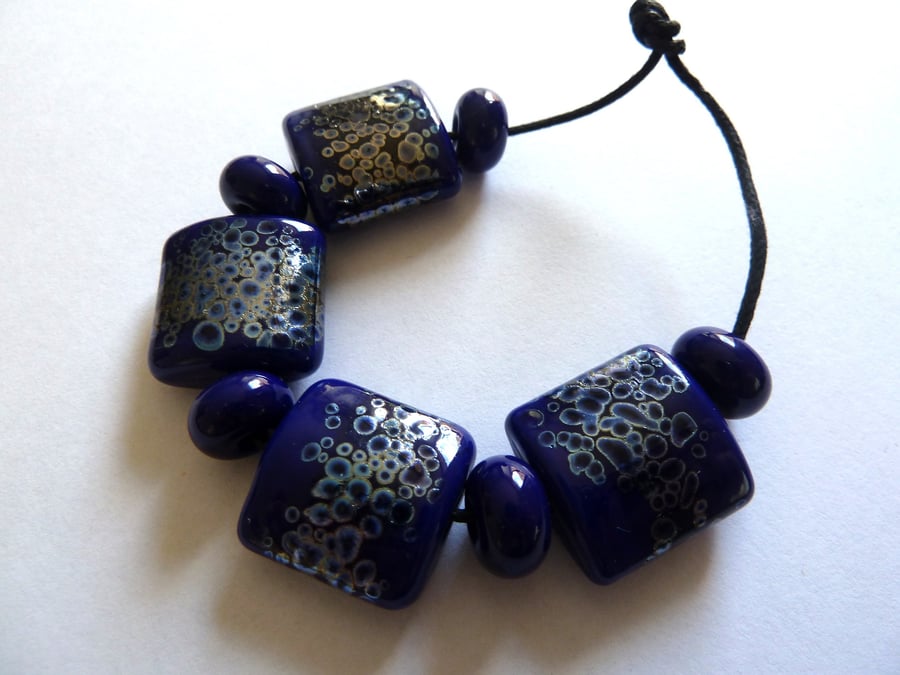 blue and silver lampwork beads