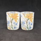 Set of decoupage glass tealights with a yellow and blue flower pattern