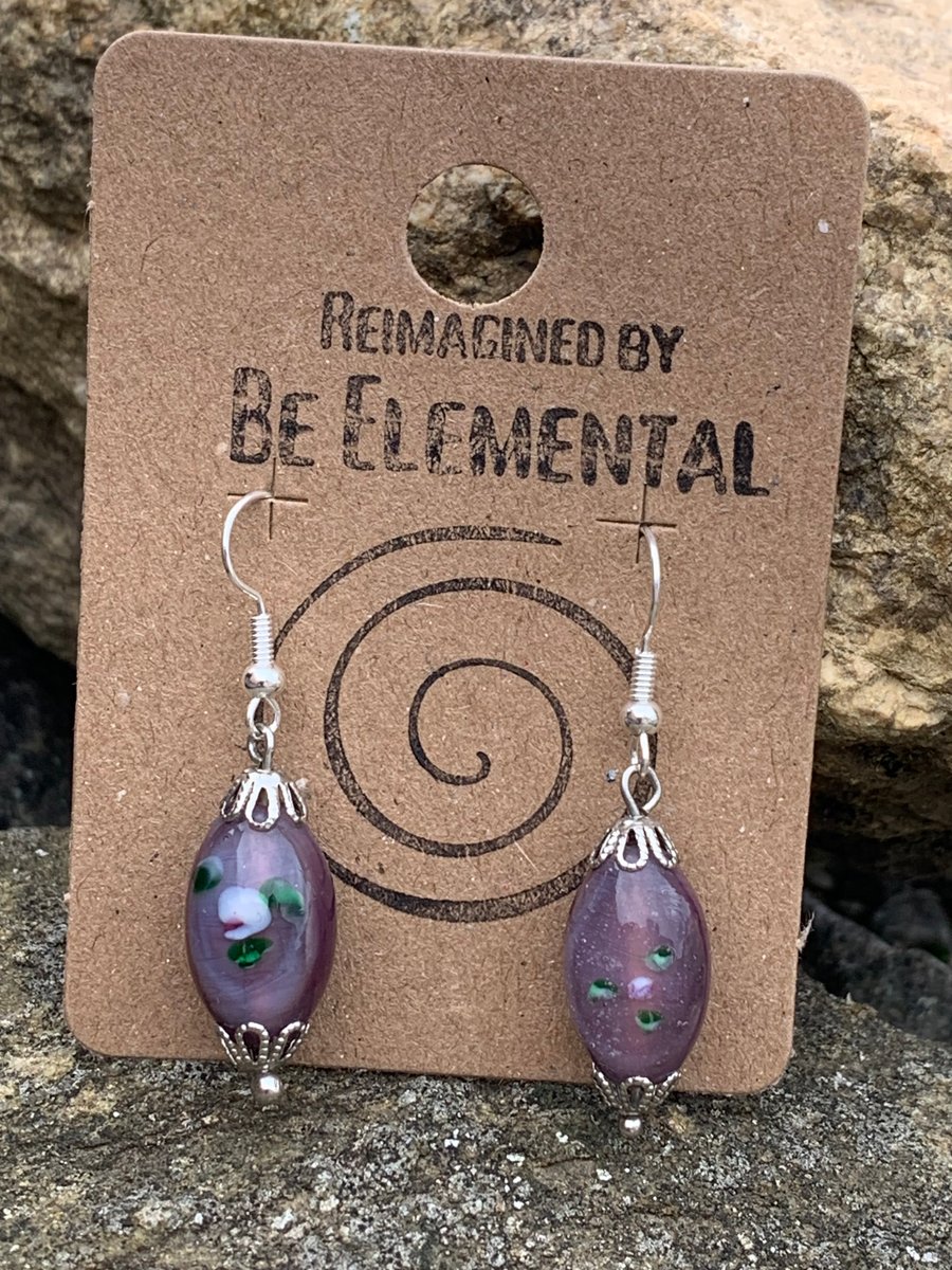 Pretty purple glass earrings, with inlayed flower design