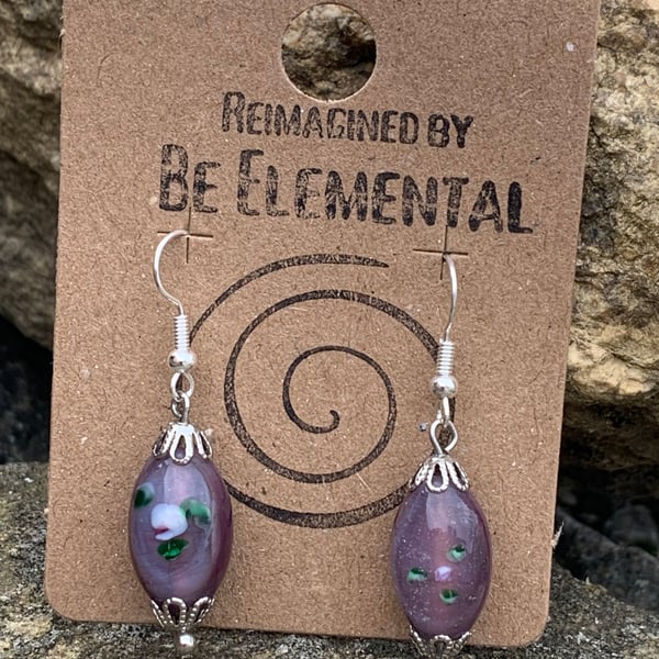 Pretty purple glass earrings, with inlayed flower design