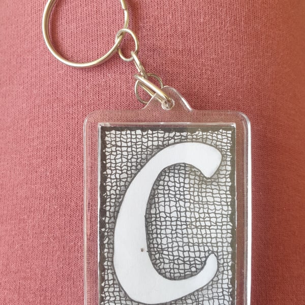 Hand drawn initial "C" keyring.