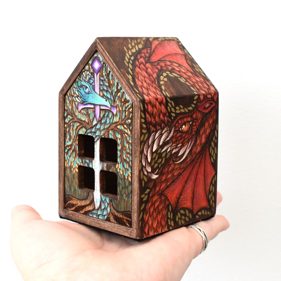 Merlin and the Dragons. Miniature pyrography house with an Arthurian theme.