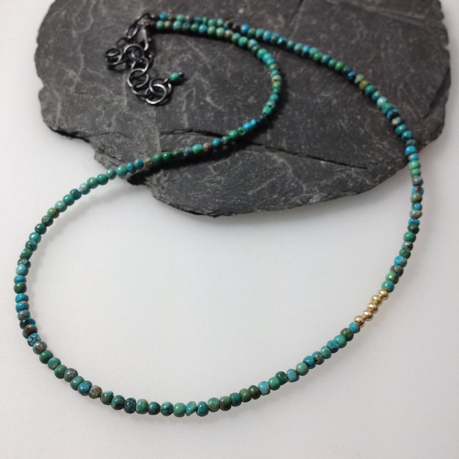 Turquoise 18ct gold and silver necklace.