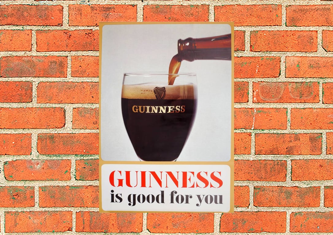 Guinness metal sign. Guinness pouring into glass. Bar, Pub, Mancave