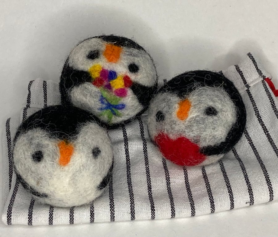Wool tumble dryer balls. Energy saving and plastic free. Three penguins