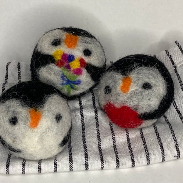 Wool tumble dryer balls. Energy saving and plastic free. Three penguins