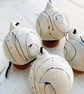 Set of four black and white swirled pebble baubles.  - Image 4