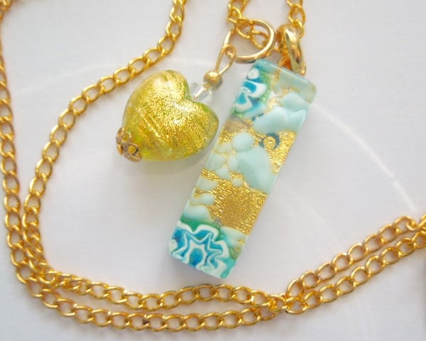 Gold and blue Murano glass heart pendant with Swarovski and gold chain.