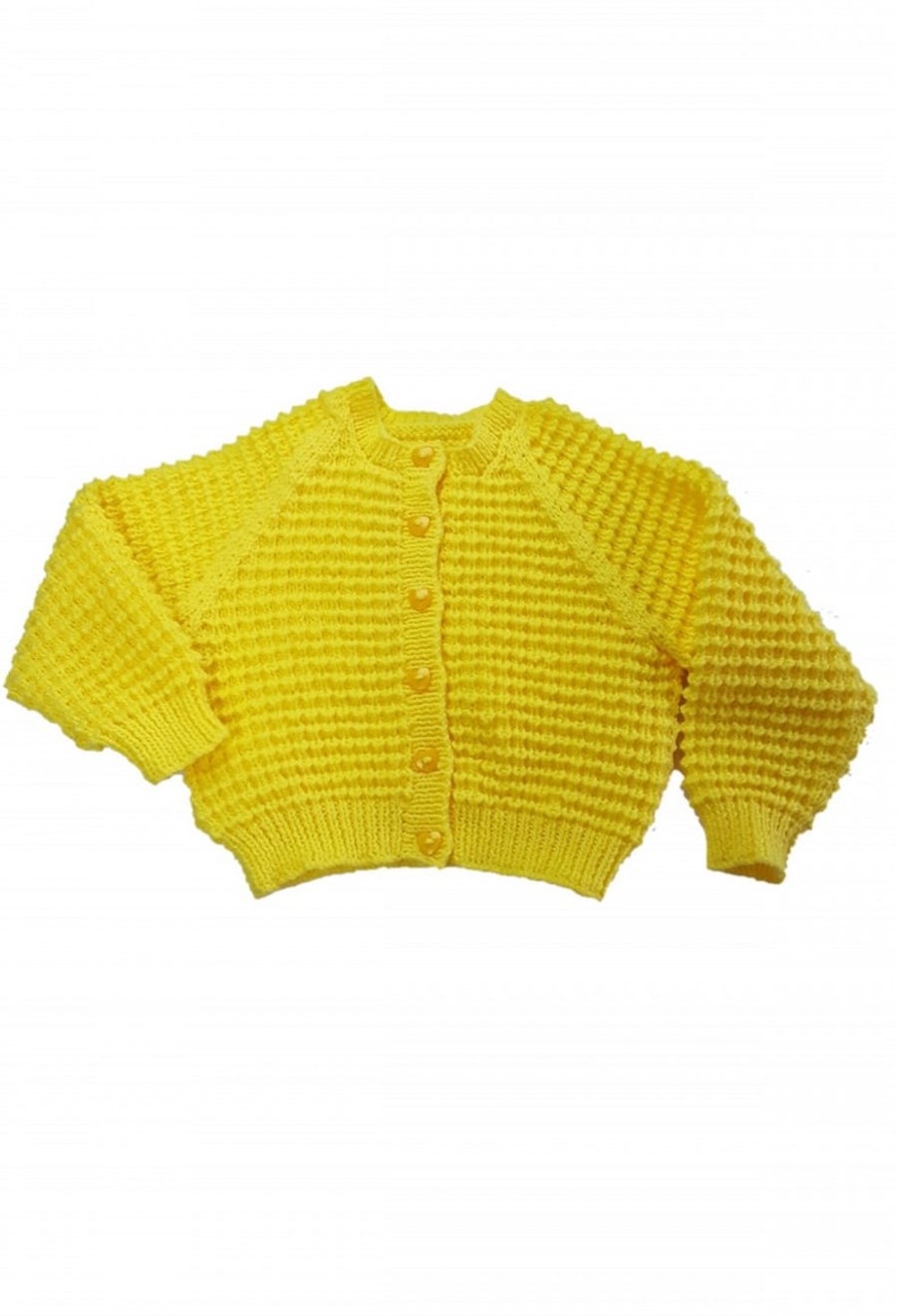 Yellow child's cardigan hand knitted with all over textured pattern 1-2 yrs