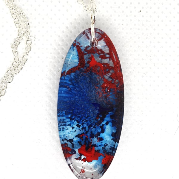 Volcanic Ocean Resin Art Necklace: Red & Blue Abstract Pendant