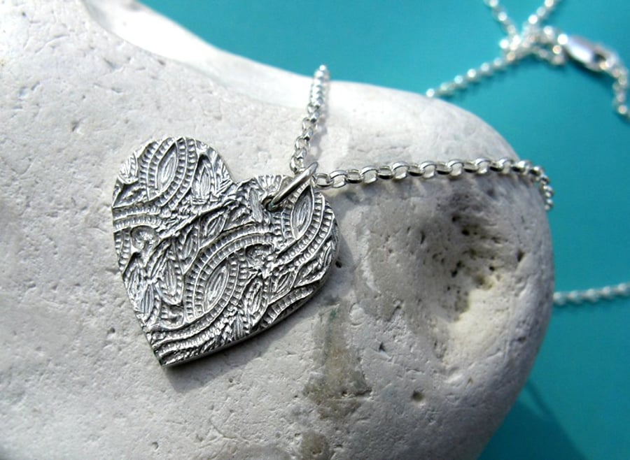 Fine silver heart necklace with surface imprint
