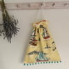Yellow sailing boats drawstring bag with pompoms