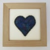 Blue love heart picture.  Turquoise and blue fabric heart with beaded edge