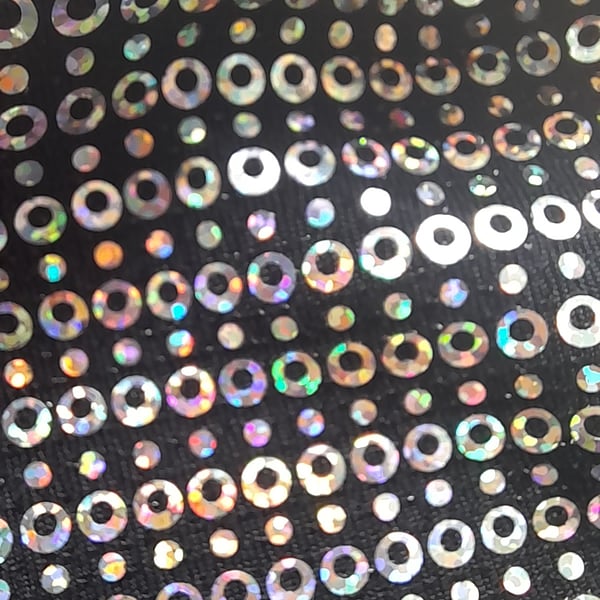 Black fabric with holographic foiled detail