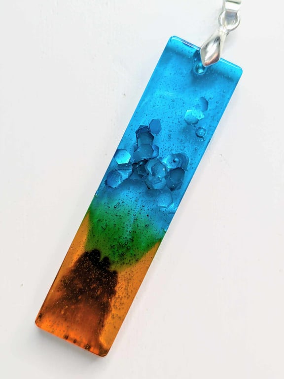 Beach Inspired Resin Pendant With Glitter