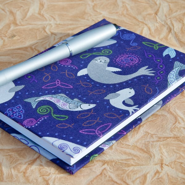 A6 Lined Notebook with full cloth smiley sea creatures cover