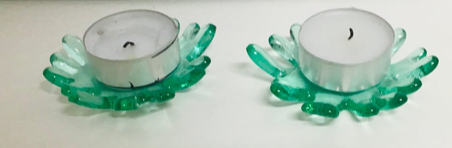 Pair of candle splashes in pretty aqua art glass 