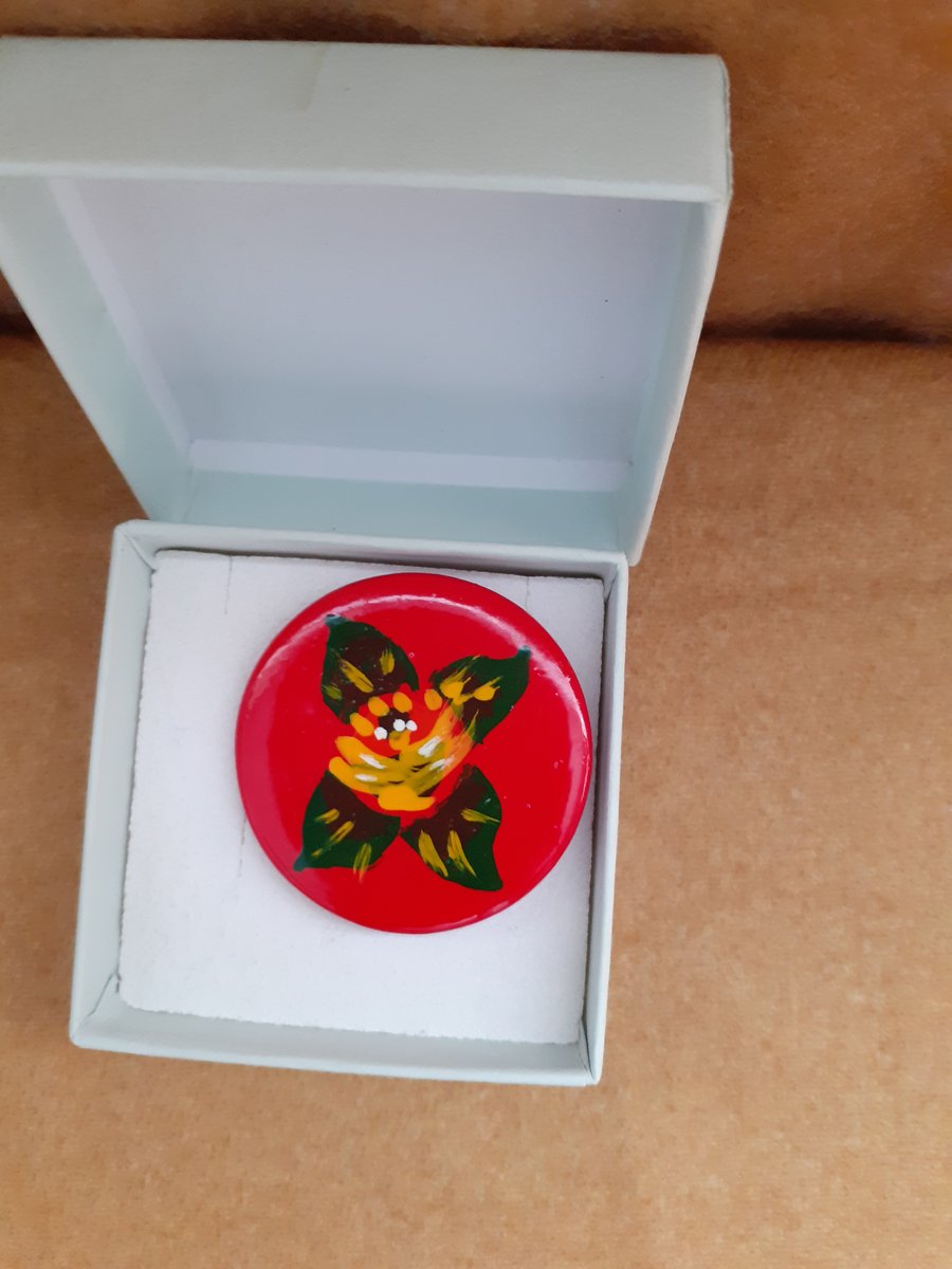 Red ceramic brooch with yellow canal art style rose