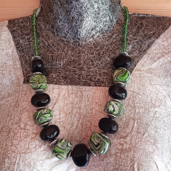 Statement necklace in green, black and silver polymer clay
