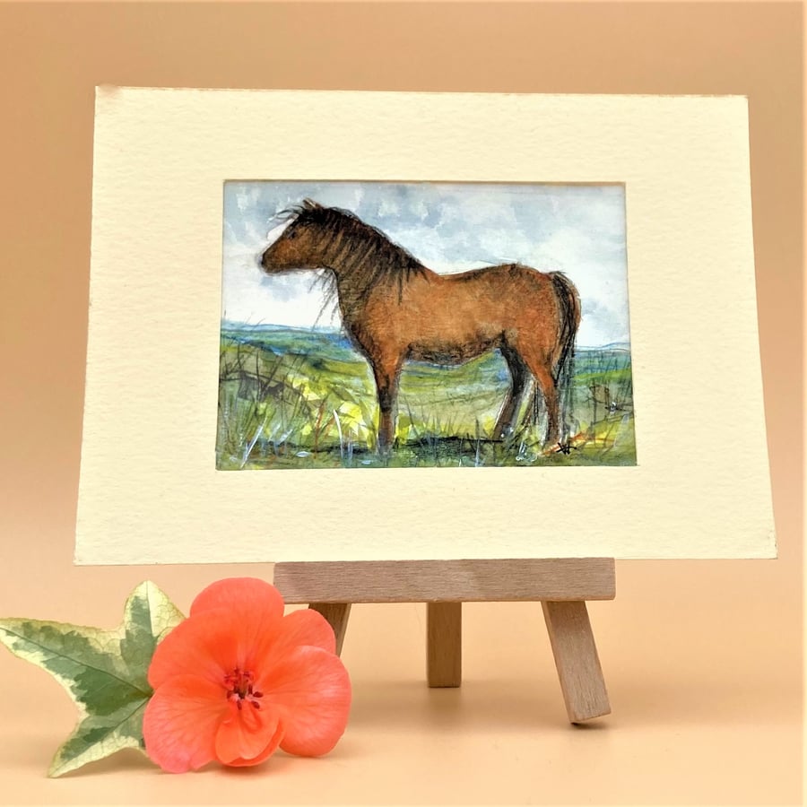 Original ACEO Watercolour painting of a Welsh Pony in a landscape 