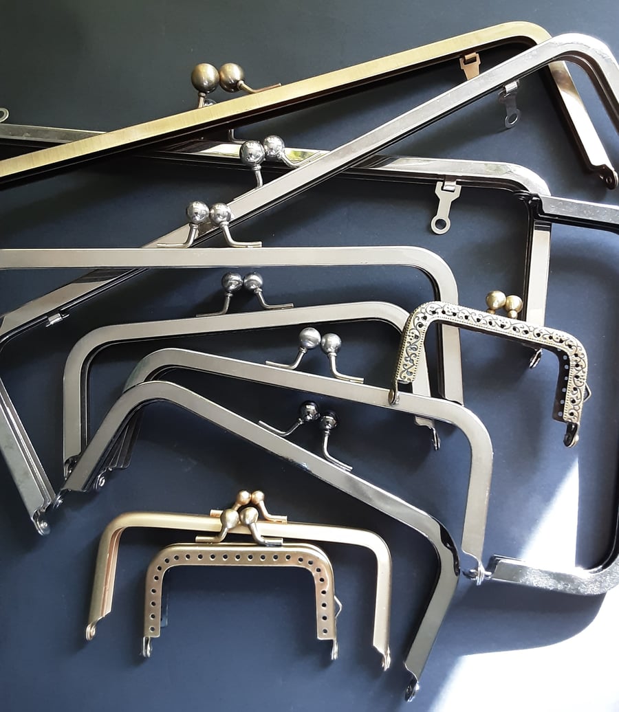 Bag Clasps. Eleven assorted designs and sizes