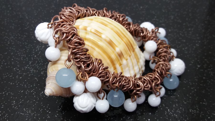 BR155 Elasticated antique copper colour beaded bracelet