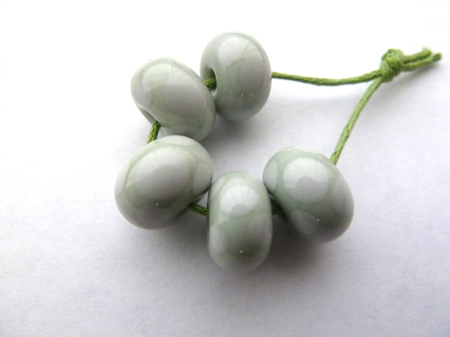 grey and green spot lampwork beads