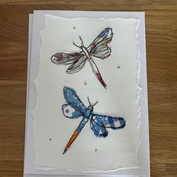 Handmade card featuring two dragonflies 