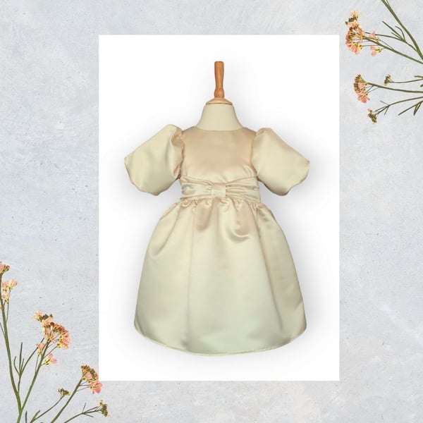 Satin Dress with Front Bow Detail, Large Back Tie and Bubble Sleeves. Age 2-3yrs