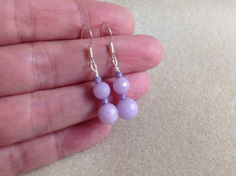 Sterling silver and faceted lavender jade earrings.