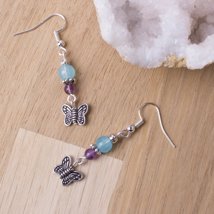 Butterfly earrings with amethyst gemstones and blue beads