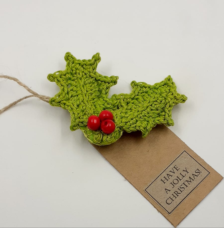 Crochet Holly Brooch on a Gift Tag