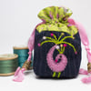 Miniature navy pinstripe drawstring bag with hand embroidered peacock