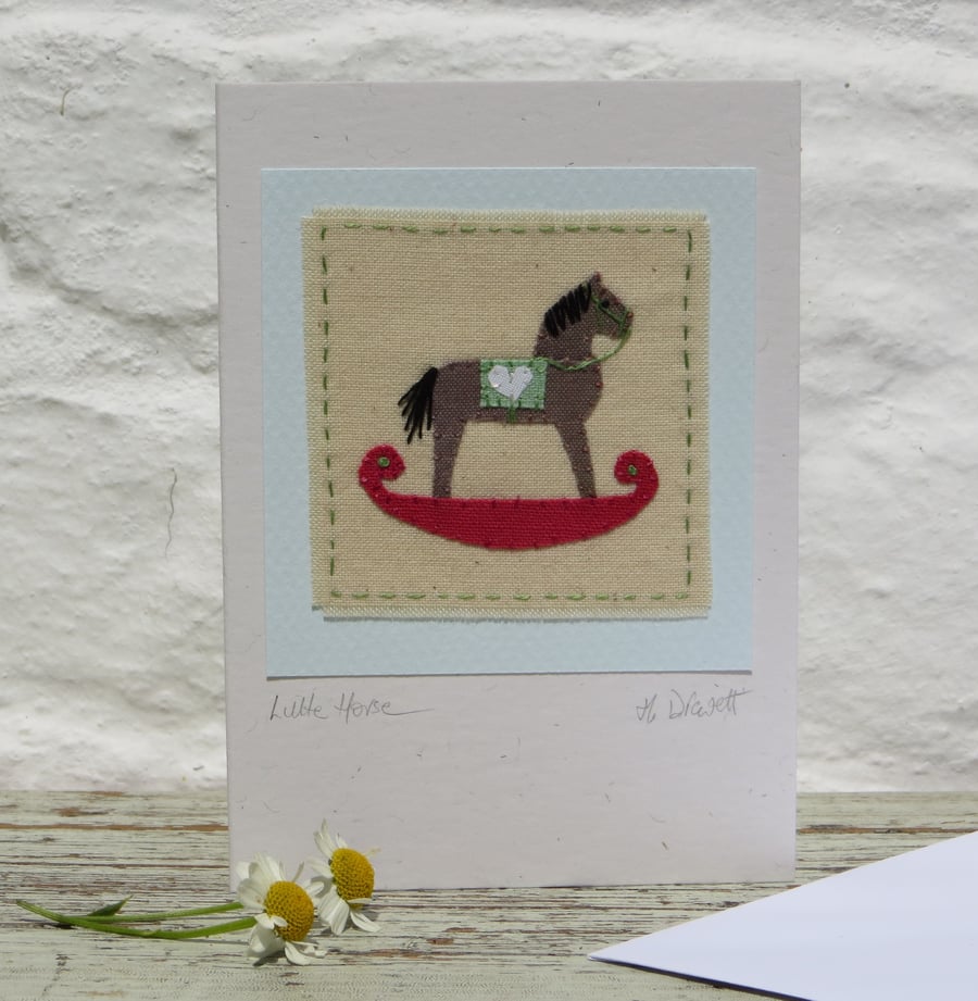 Hand-stitched rocking horse applique mounted on card - lots of detail, to frame?