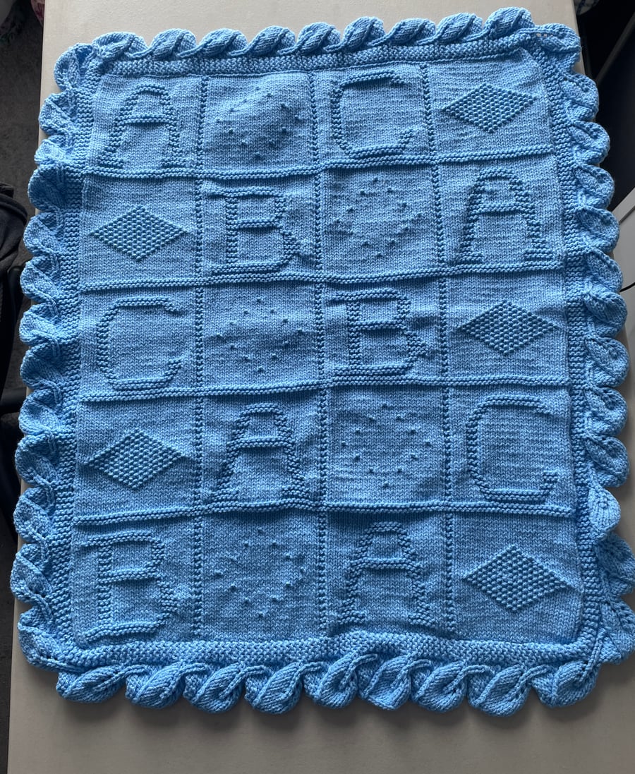 Handknitted ABC Baby Blanket