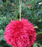 Hand Knitted Red Tinsel Bauble - Image 1