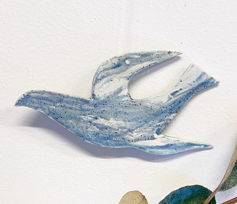 Hand glazed hanging bird ceramic decoration- blue and white glazes 12cm