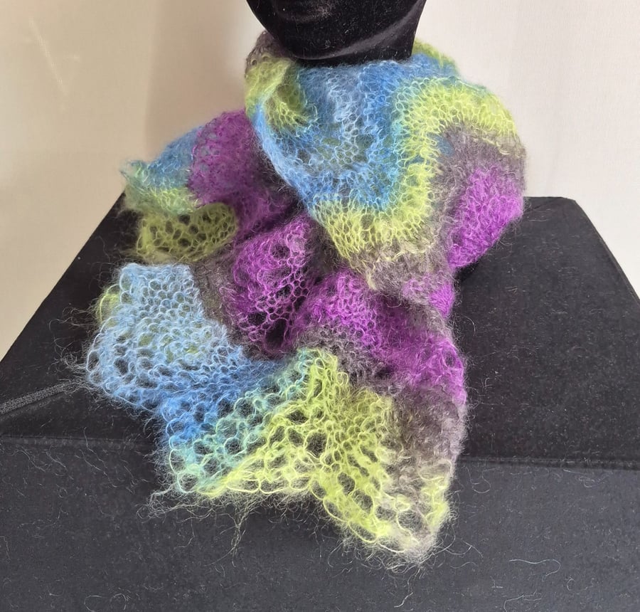 47. Handknitted Fine Lacy Scarf .Multicoloured . Measures 50" x 8"