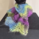 47. Handknitted Fine Lacy Scarf .Multicoloured . Measures 50" x 8"
