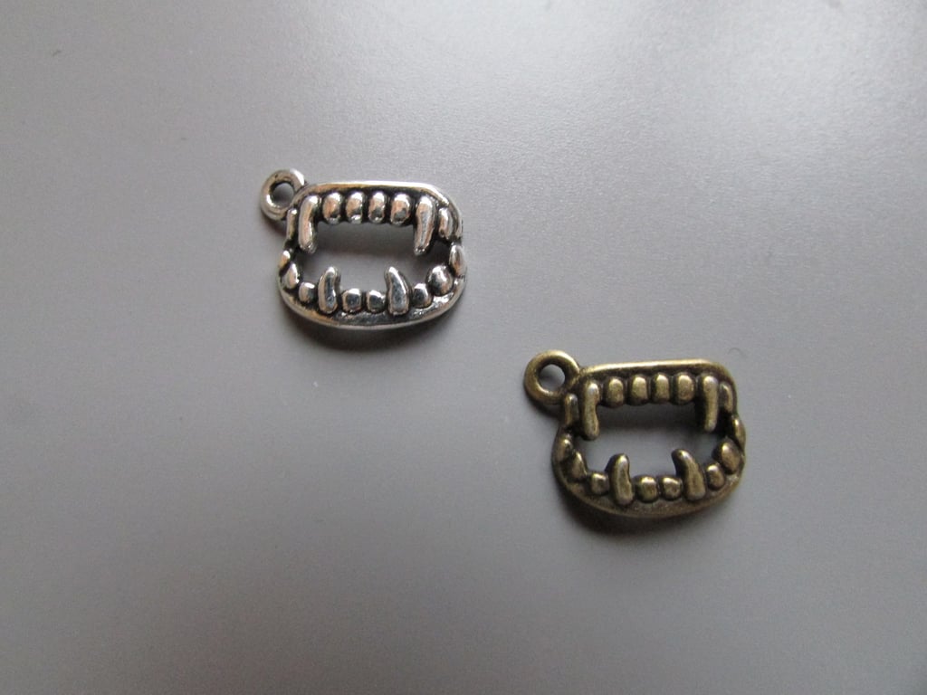 Vampire fangs Tibetan Charm x 2