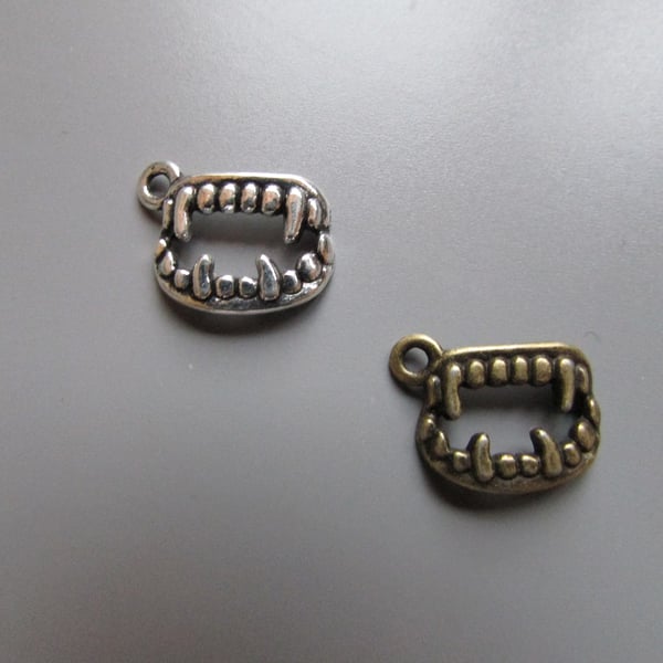 Vampire fangs Tibetan Charm x 2
