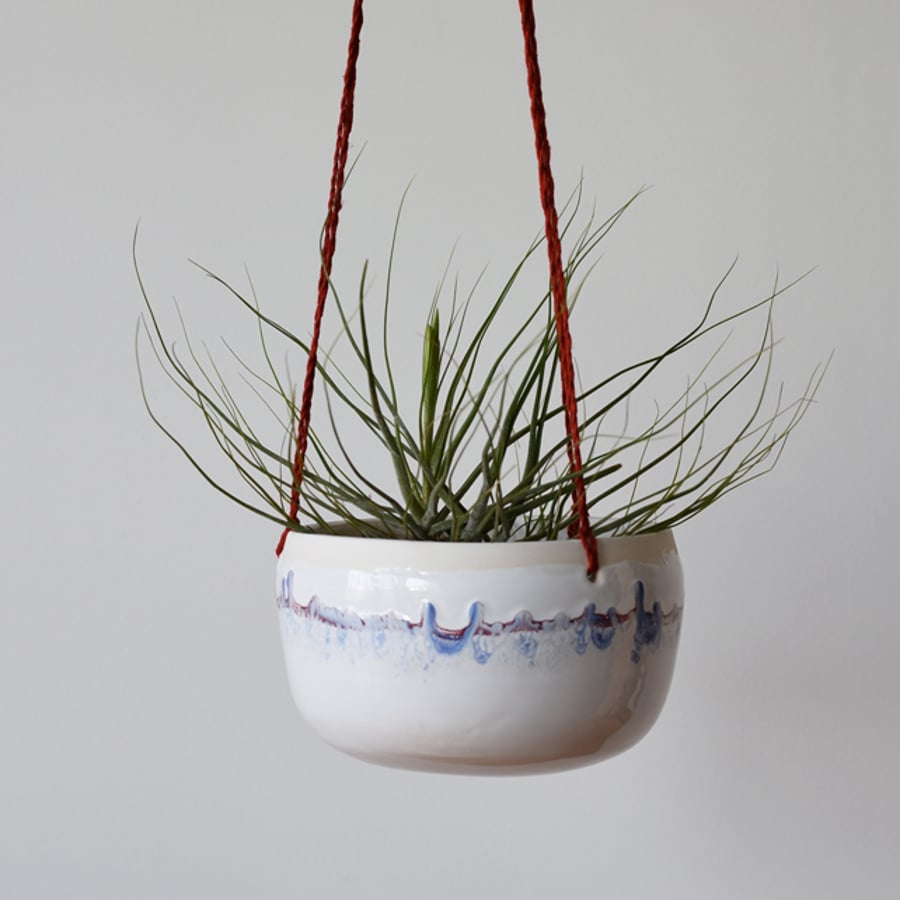 Bowl-shaped ceramic hanging planter in white red and blue - handmade pottery