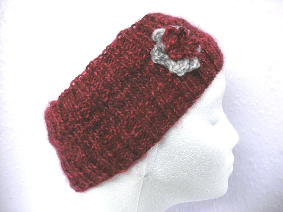 Hand knitted Flowered headband in dark reds