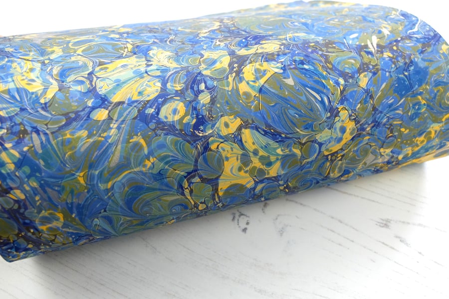 Double marbled drawn stone pattern A4 marbled paper sheet in blue yellow gold