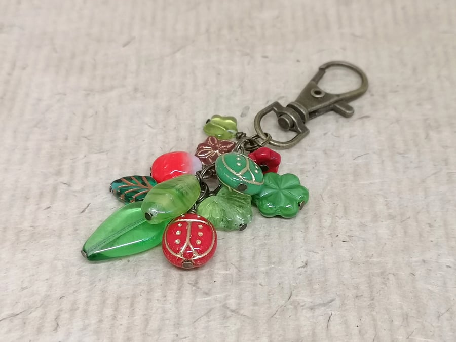 Red and green ladybird bag charm