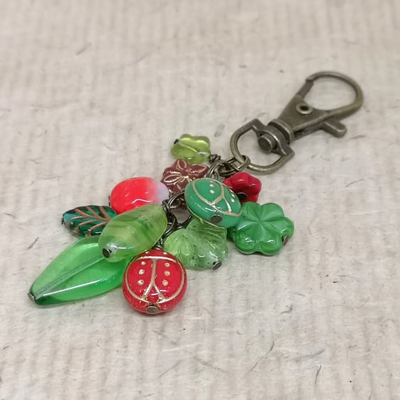 Red and green ladybird bag charm