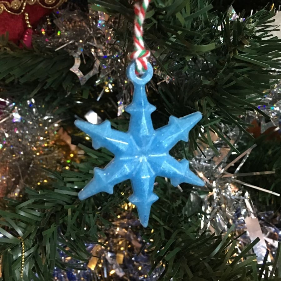 Blue snowflake Christmas tree decoration.